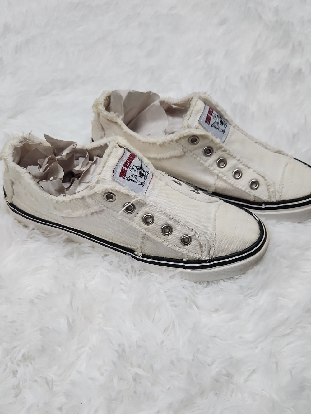 True Religion Slip-On Canvas Sneakers in White with Black Trim